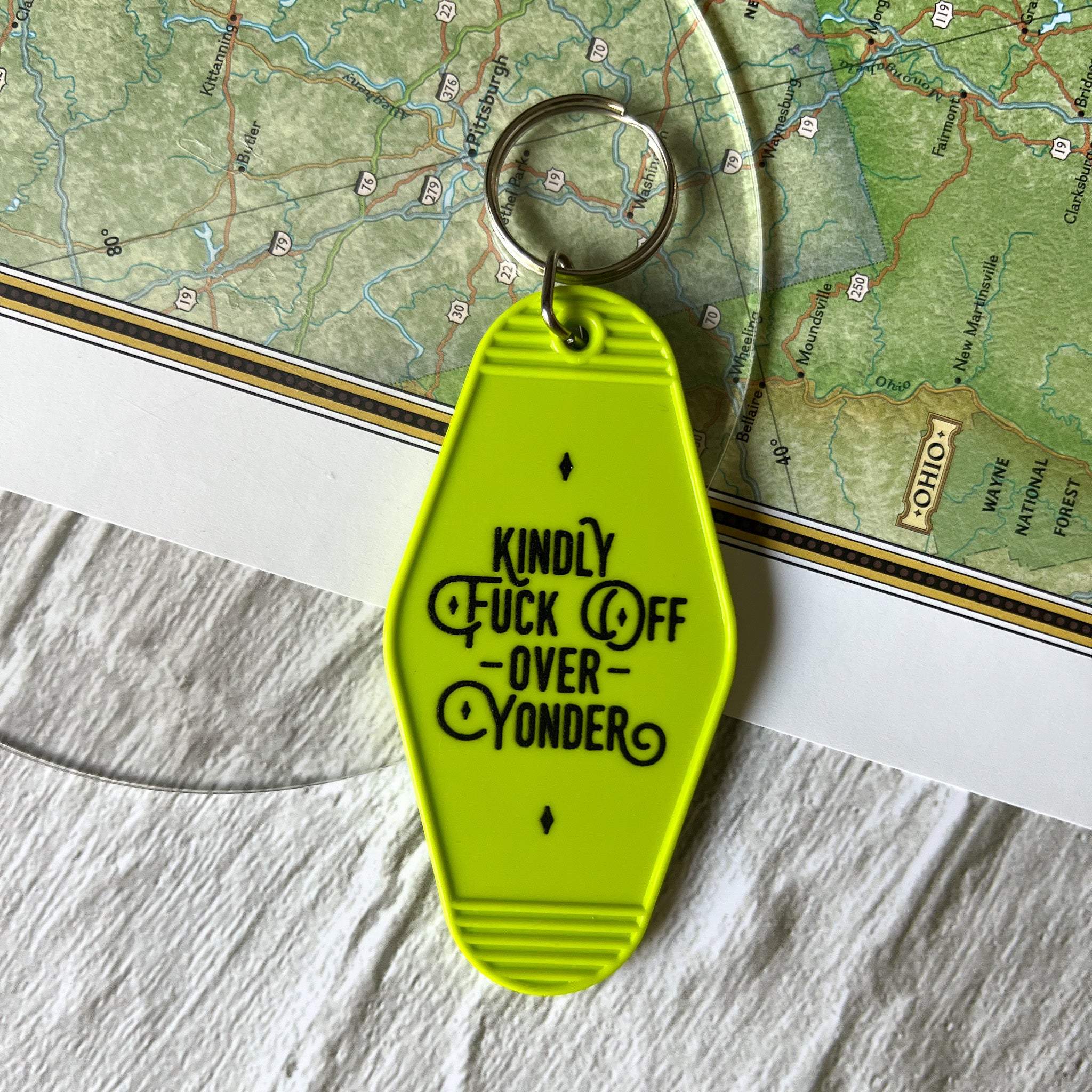 kindly fuck off // motel keychain