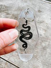 y'all be careful snake // motel keychain