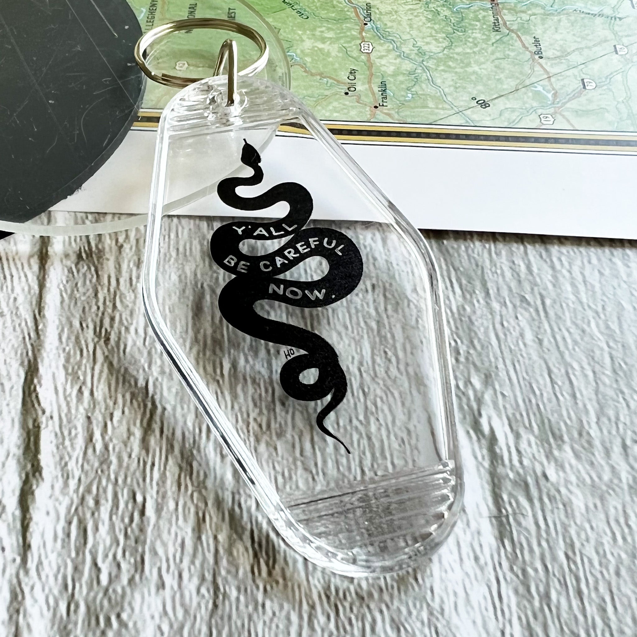 y'all be careful snake // motel keychain