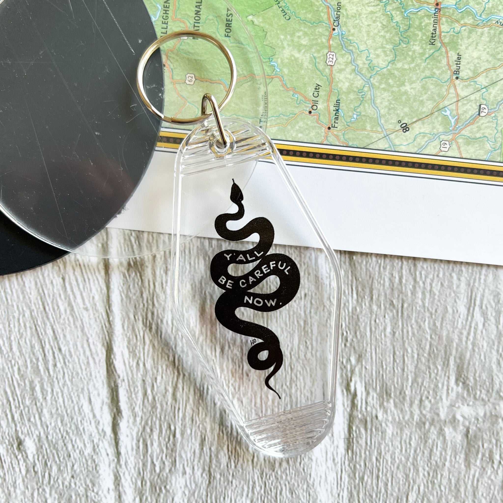 y'all be careful snake // motel keychain